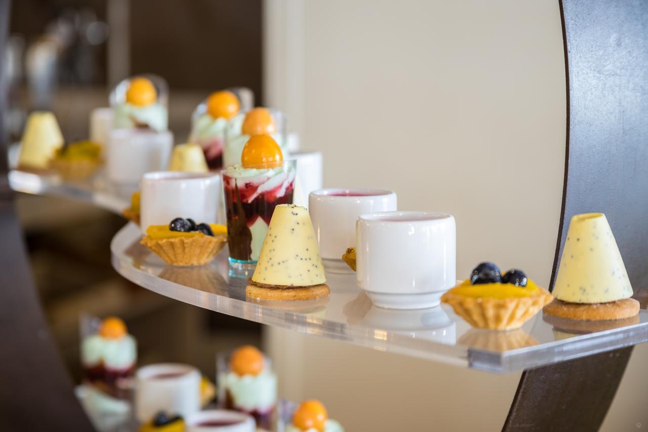 Ghl Hotel Capital Bogota Exterior photo A selection of desserts